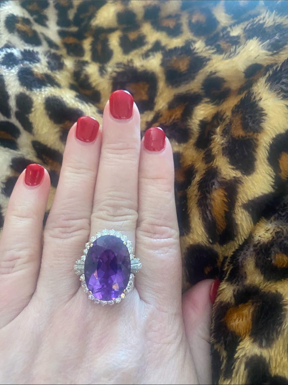 Amethyst and diamond Oval Halo Statement Ring, 14 kt yellow gold